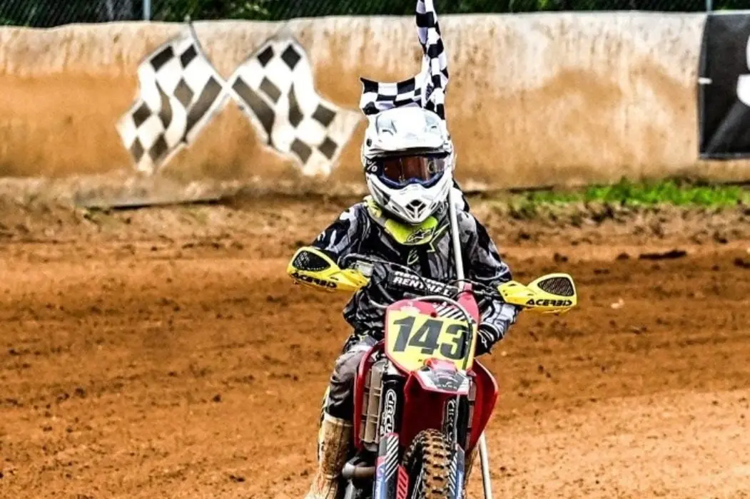 Hayden Duggan laps with the chequered flag after leading all the way to win the Australian Dirt Track title. PHOTOS: Supplied