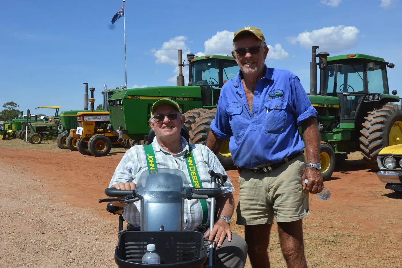Goonumbla farmer Edgar Orr, beaming in his John Deere suspenders, had 14 tractors on display at Trundle Back In Time. Here he is catching up with Bob Wythes from Forbes. PHOTOS: Christine Little