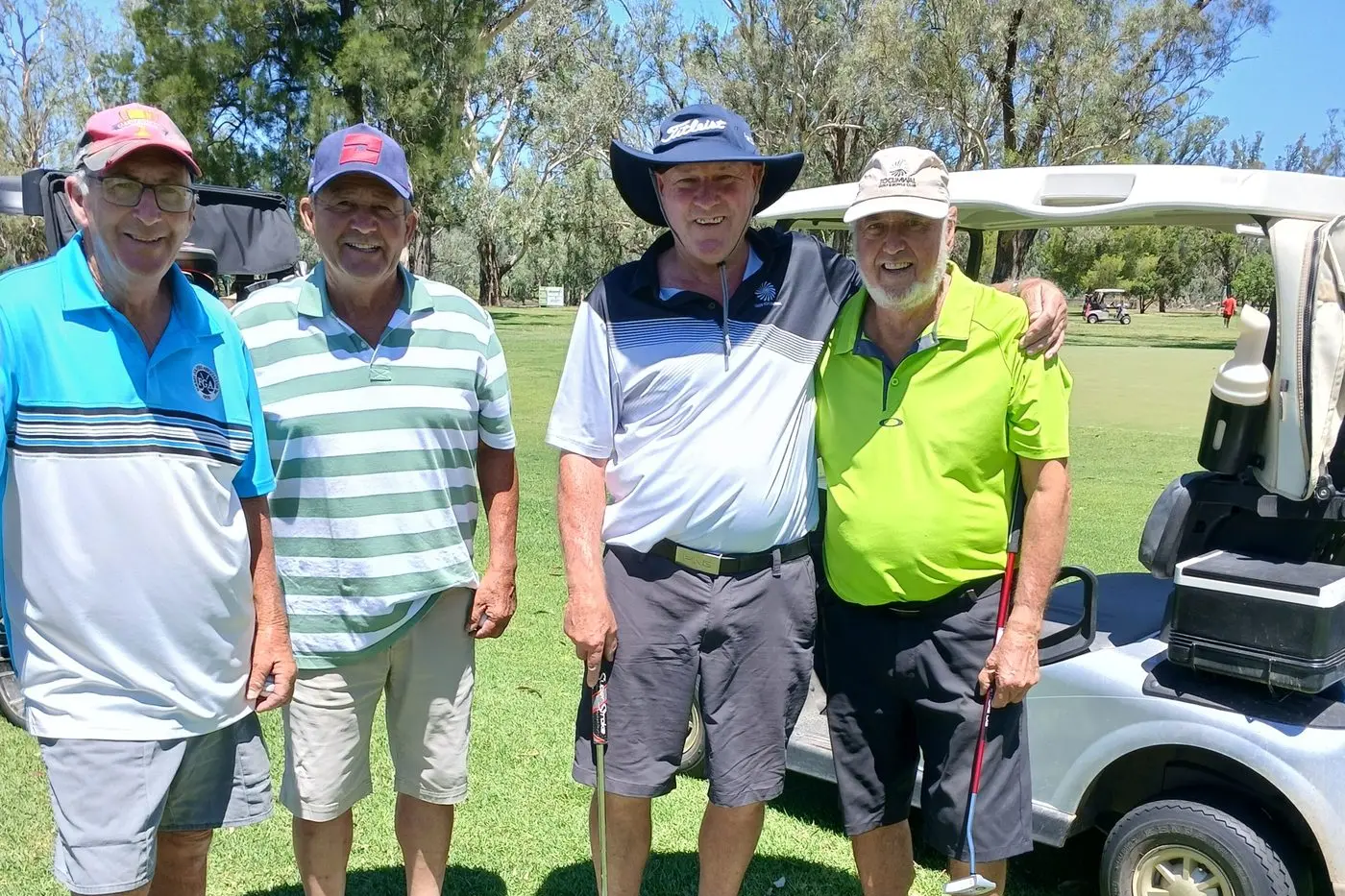 Bruce Chandler, Brian Doyle, Niel Duncan and Peter Grayson all happy after golf and looking forward to escaping the windy conditions. PHOTO: Short Putt