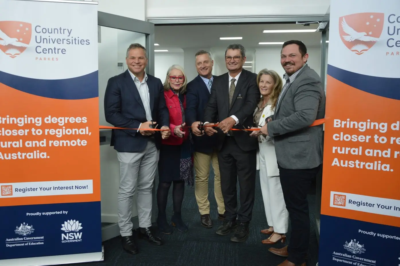 State Member for Orange Phil Donato, Forbes Mayor Phyllis Miller, Federal Member for Parkes Jamie Chaffey, Parkes Mayor Neil Westcott, Country Universities Centre Parkes chair Tracie Robertson and centre director Jacob Cass cut the ribbon on 18 June. PHOTOS: Madeline Blackstock