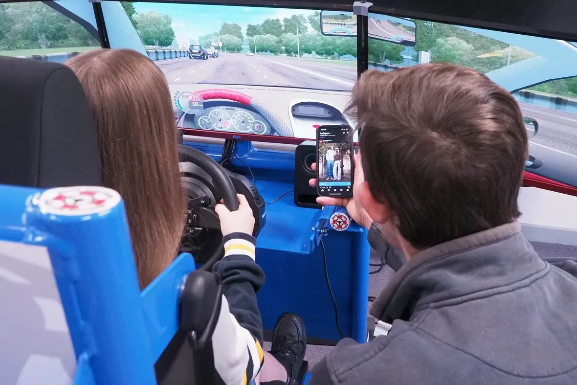 This is a student using a mobile phone while driving. It\\u2019s perfectly safe: they are in a simulator. PHOTOS: Ken Engsmyr