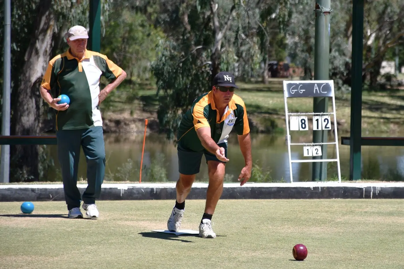 Bert Bailey watches Mick Merritt bowl in weekend major pairs competition. PHOTO: Jenny Kingham