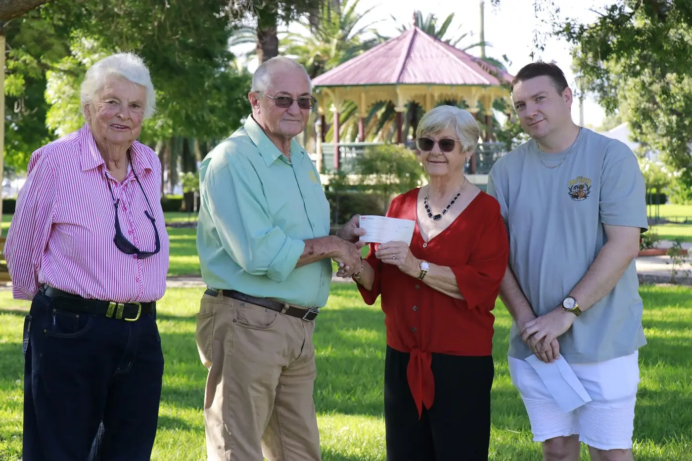 Forbes CanAssist president John Shrader accepts the cheque from Forbes Country Music Club Inc\\'s vice president Frances Hodges, president Wendy Dixon and secretary Steven Dixon.