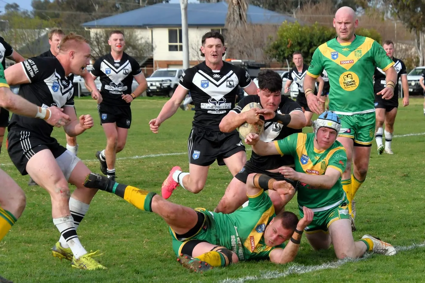 Desperate defence from Orange CYMS as Jack Hartwig seeks a try for Magpies. Picture by Jenny Kingham