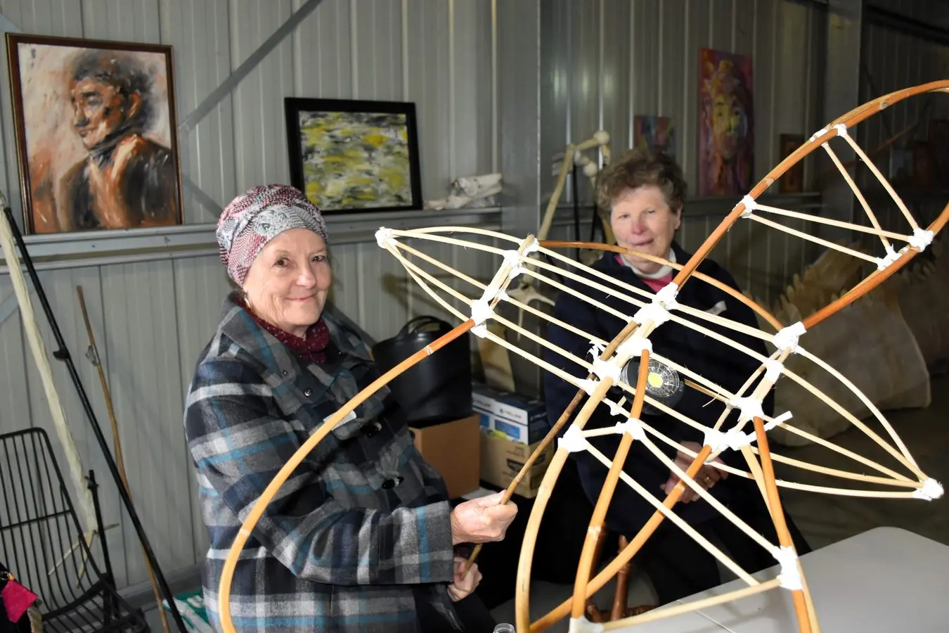Joan Paterson and Jill Davis with a cane frame and light for the Bogong Moth. Photo by Jenny Kingham