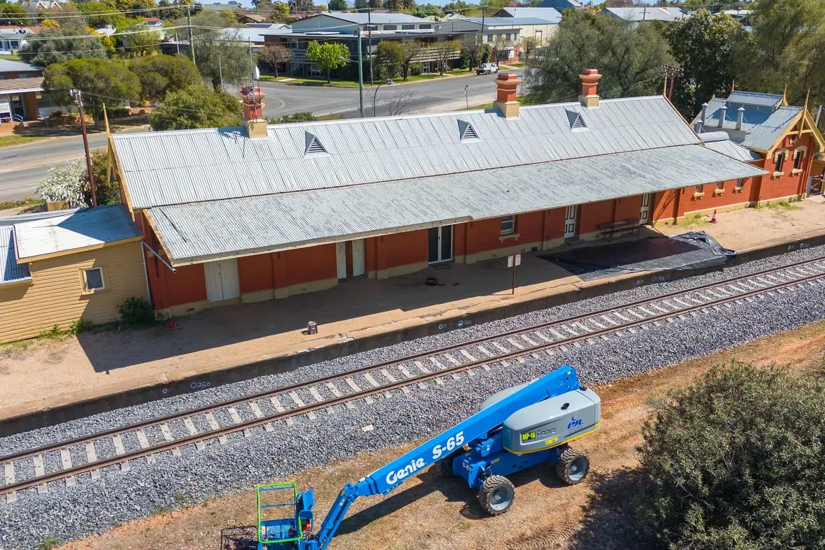 The awning at Forbes Station was trimmed by 300mm and the track was slewed laterally by more than half a metre during the September possession to enable the safe passing of double-stacked freight trains. PHOTO: Supplies