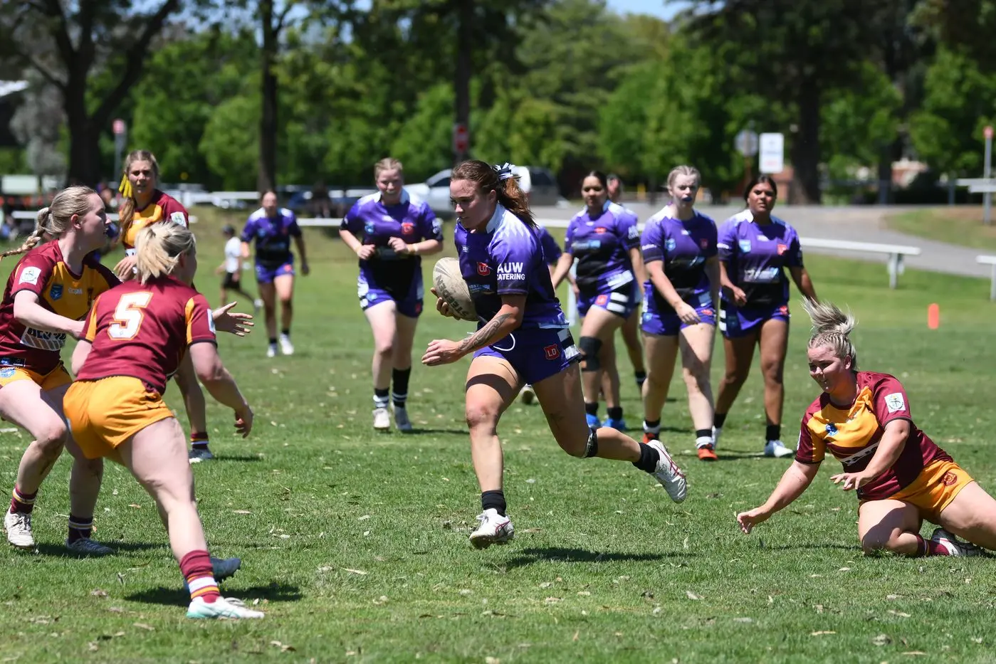 Madi Barclay-George gaining ground for Lachlan in Sunday\\'s Opens clash against Woodbridge. PHOTO: Renee Powell