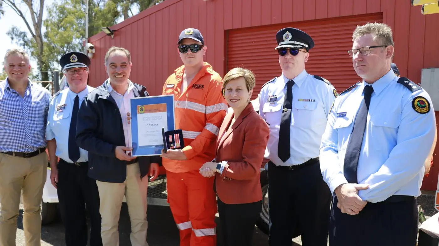 Macky Den honoured for flood bravery