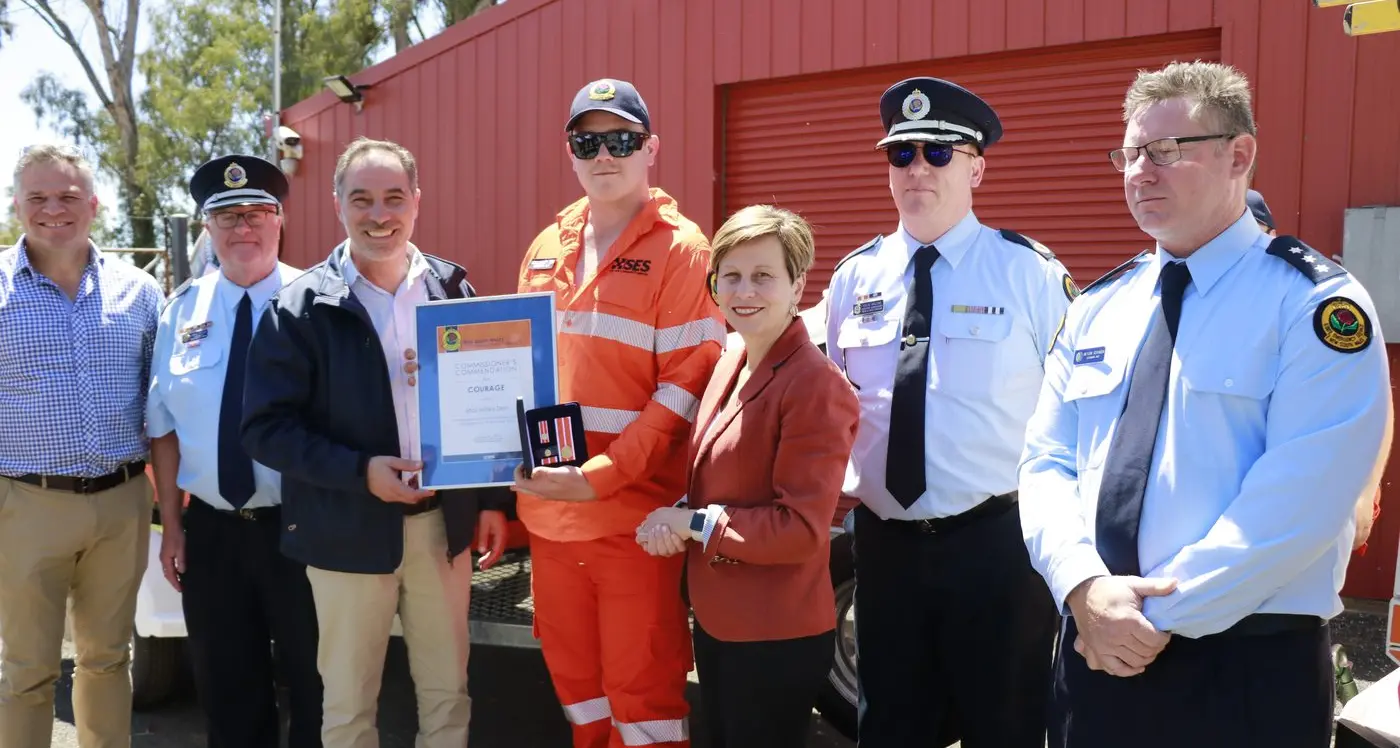 Macky Den honoured for flood bravery