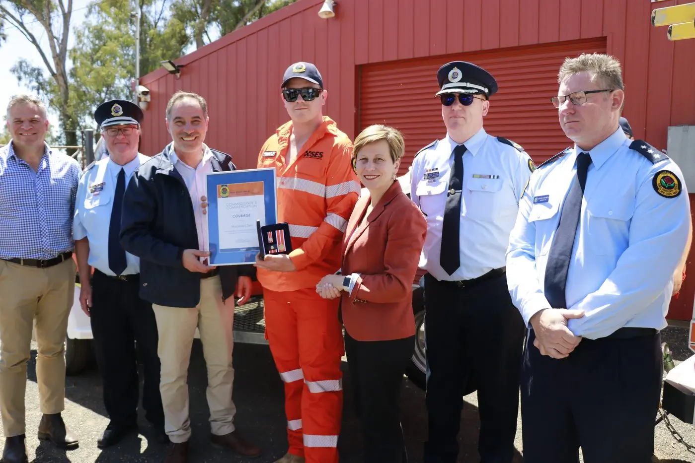 Macky Den honoured for flood bravery