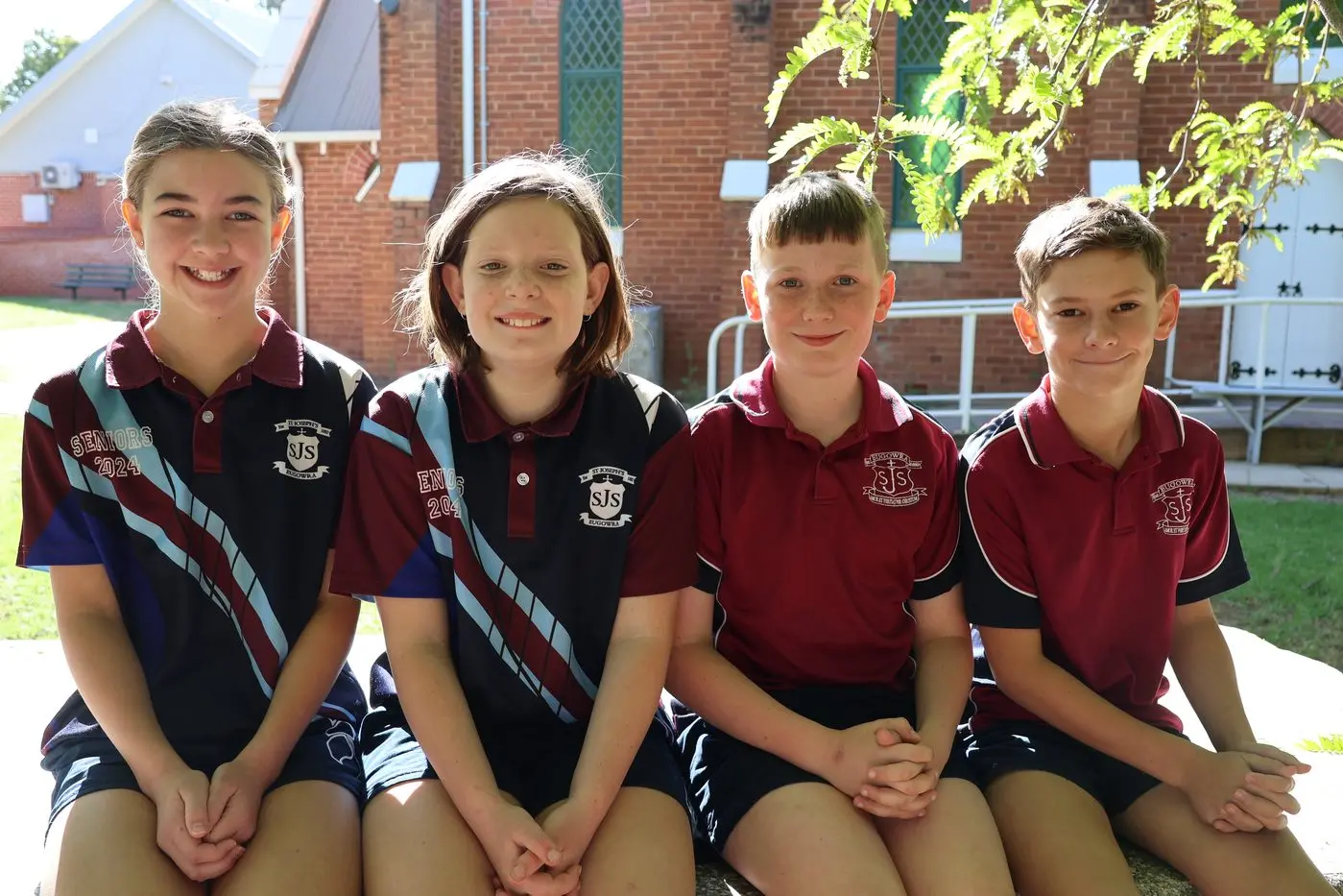 Belle, Olivia, Zac and Sam present their school\\'s flood warning prototype to a national competition this week. PHOTO: Supplied