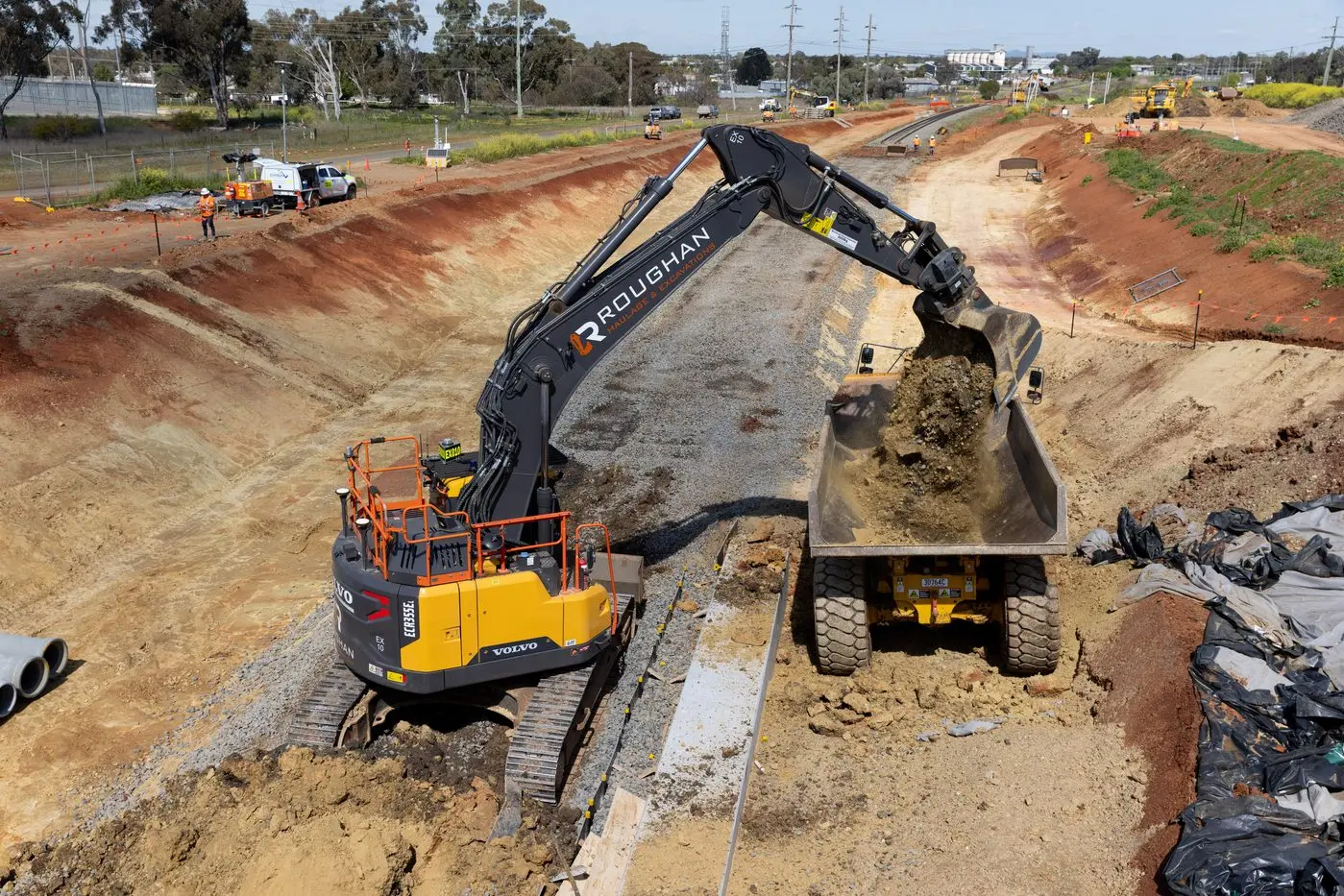 Heavy machinery in the rail corridor carry out excavation work to lower the track under the Wyndham Avenue bridge during this week\\u2019s rail possession. PHOTO: supplied