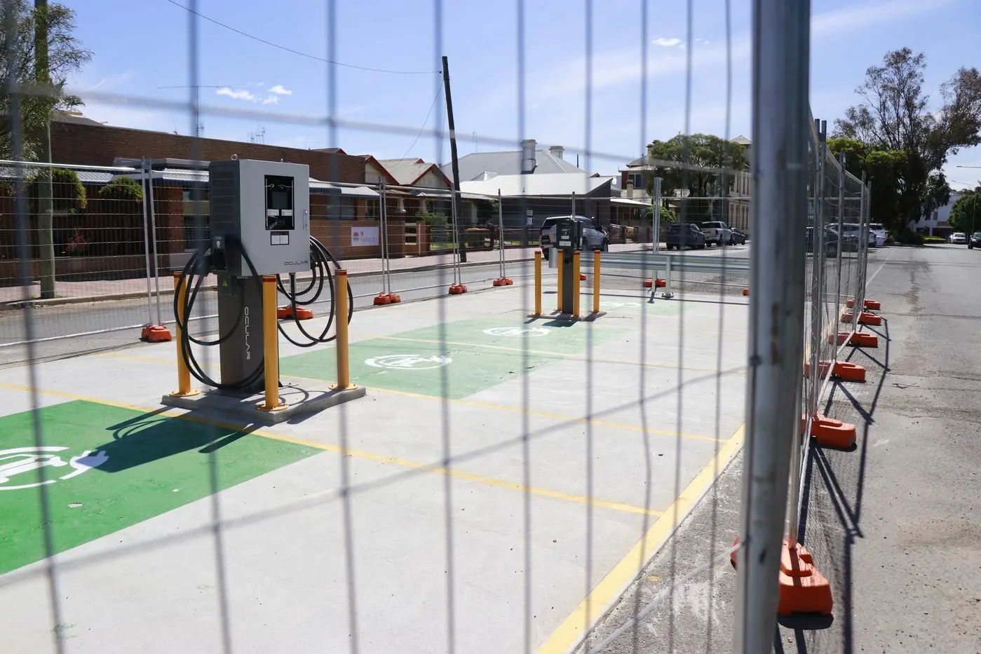 Electric vehicle chargers have been installed in Spring Street, but not connected.