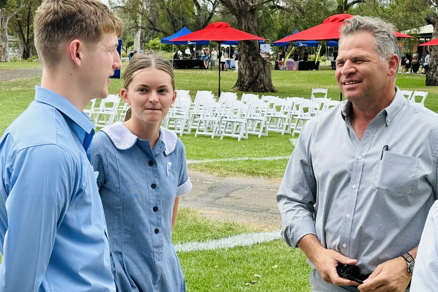 Member for Orange Philip Donato speaking with Red Bend 2025 leaders Lachlan Kupkee and Ruby Arnott. PHOTO: Supplied