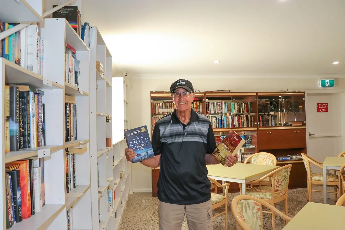 Harley Stewart in the expansive Forbes Men\\'s Shed library.