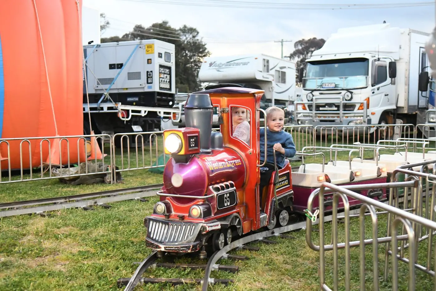 Aurora and Felix Maguire enjoying a train ride in sideshow alley at the 2023 Show. File picture