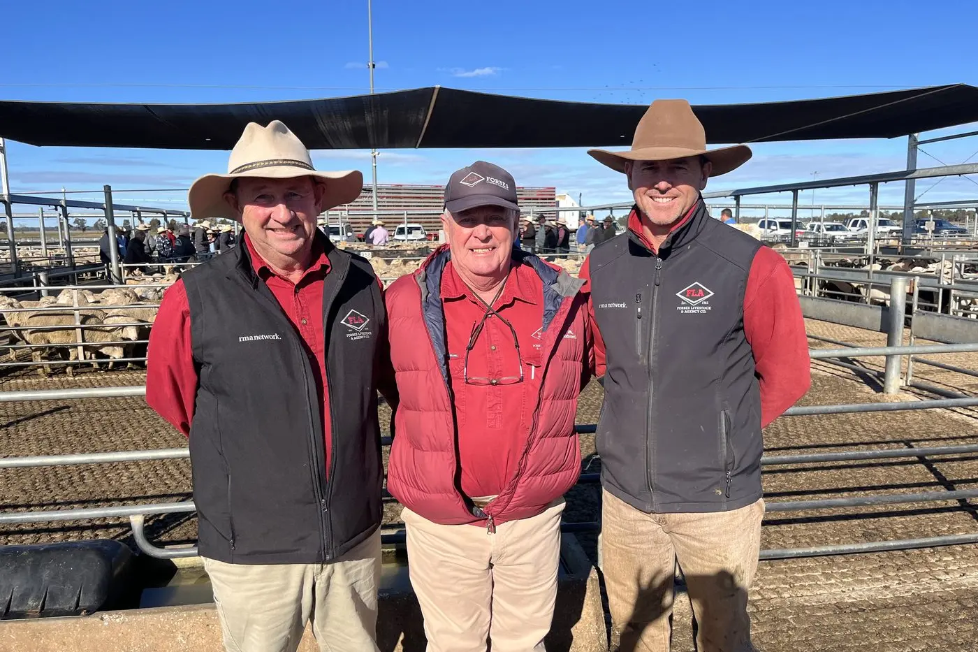 Bill Dunn (centre) with Forbes Livestock\\'s Tim Mackay and Randall Grayson. Picture Forbes Livestock