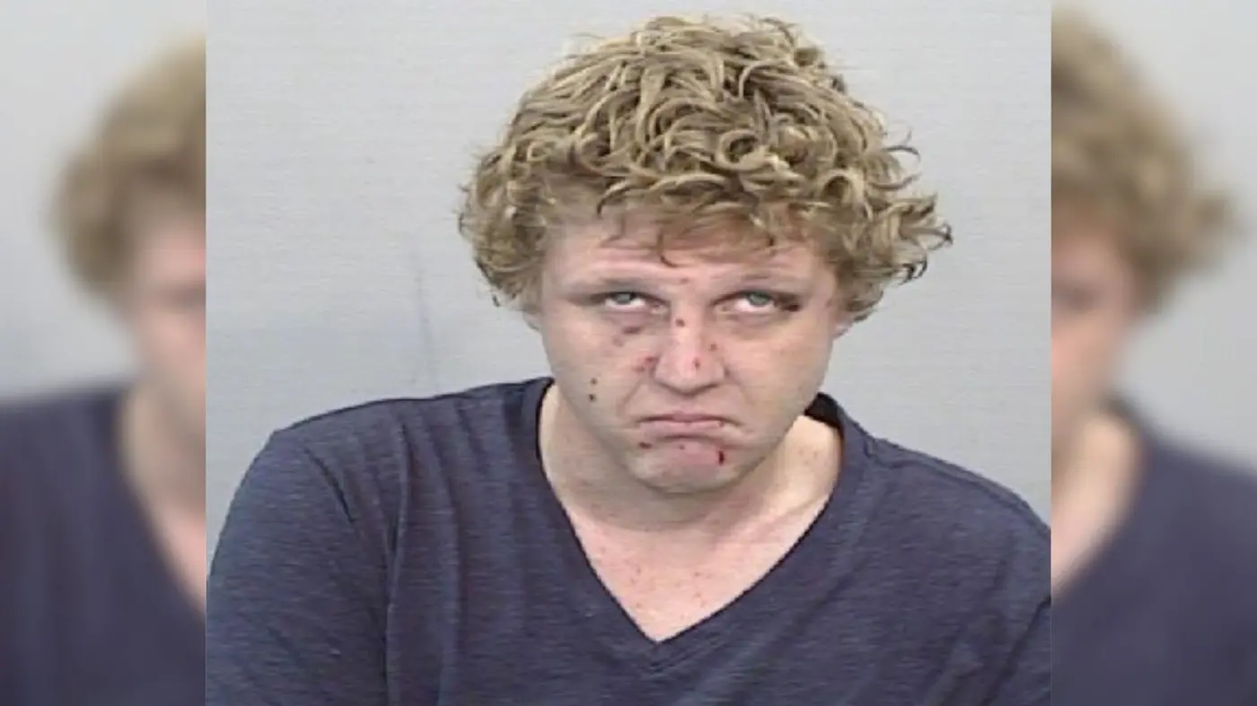 Man on outstanding warrant wanted by police