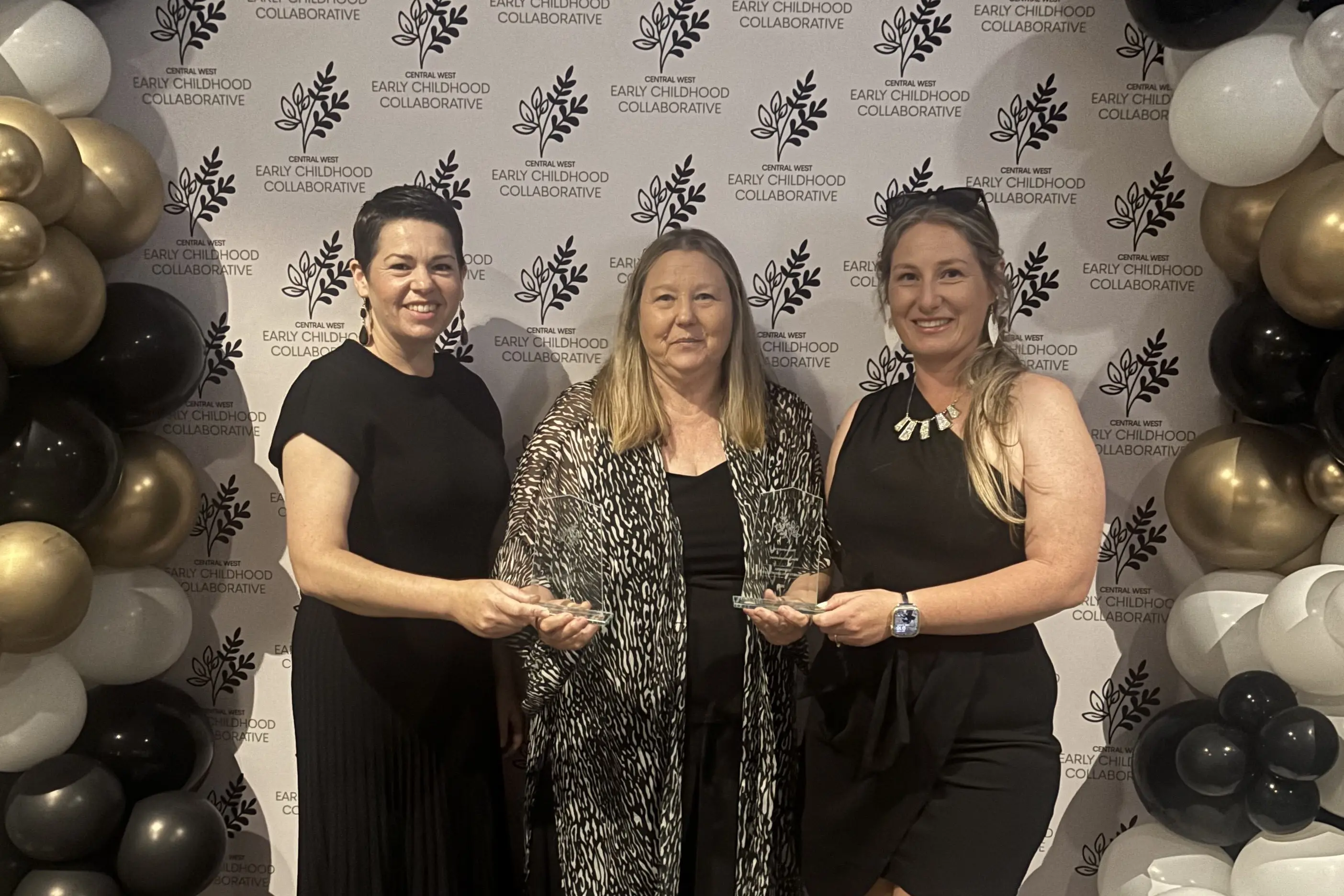 <p>Eugowra Community Children\\'s Centre\\'s Brodie Middis, director Raewyn Molloy, and Kayla Jones with the Excellence in Community and Yindyamarra Winhanganha awards. </p>\\n