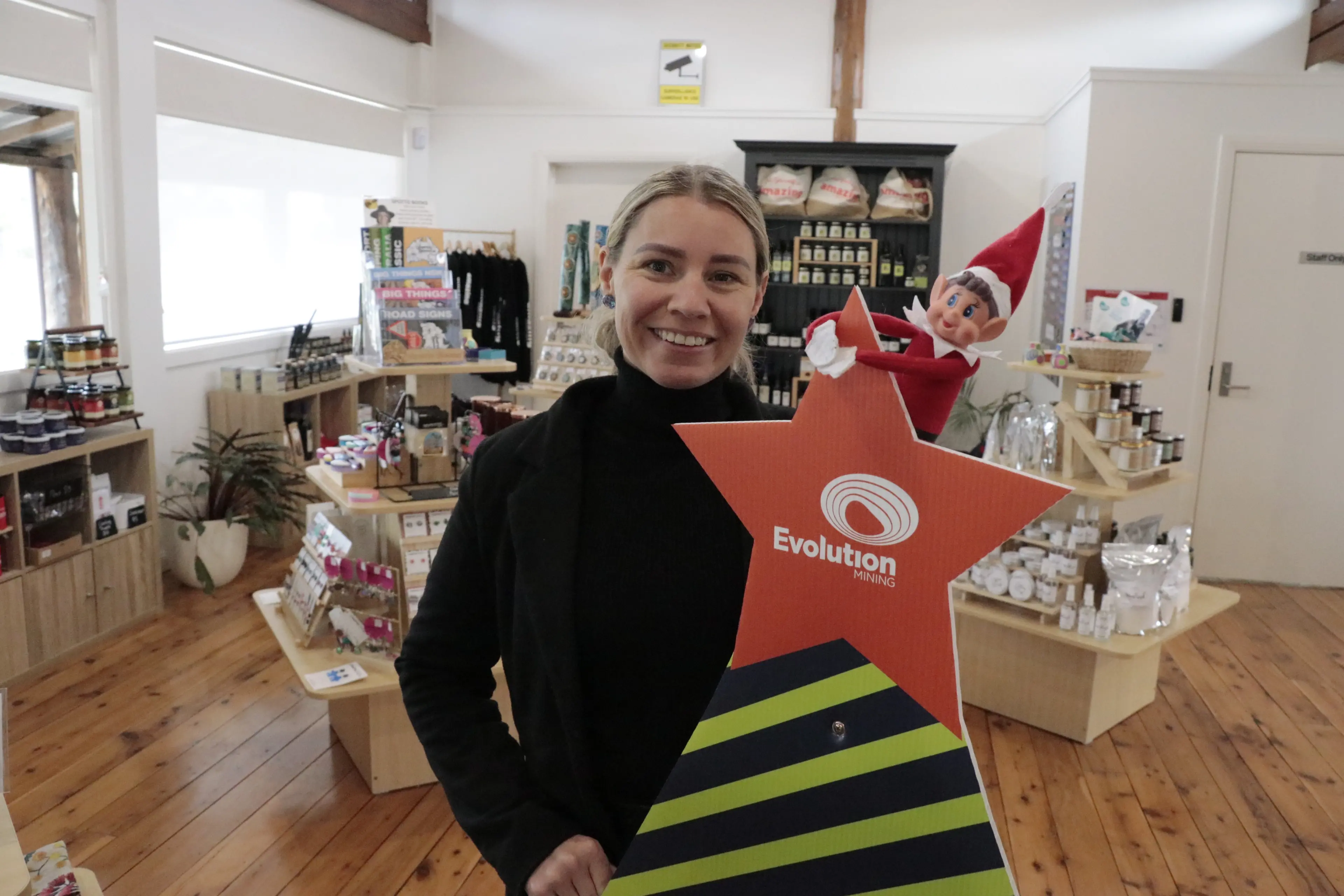 <p>Ash Hoy at the Forbes Visitor Information Centre is encouraging families to shop local and the elves this Christmas. </p>\\n