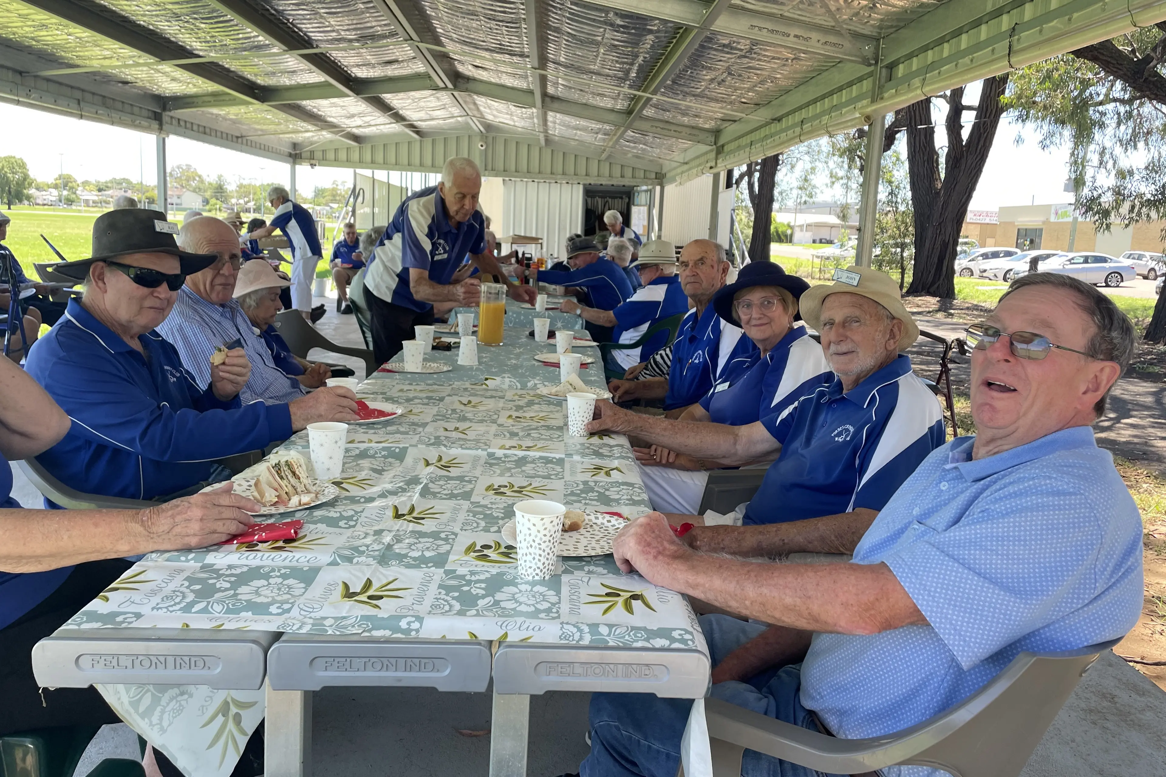 <p>Croquet Club members enjoying lunch in the shady undercover area in December 2024. This year\\'s lunch is on 9 December.</p>\\n