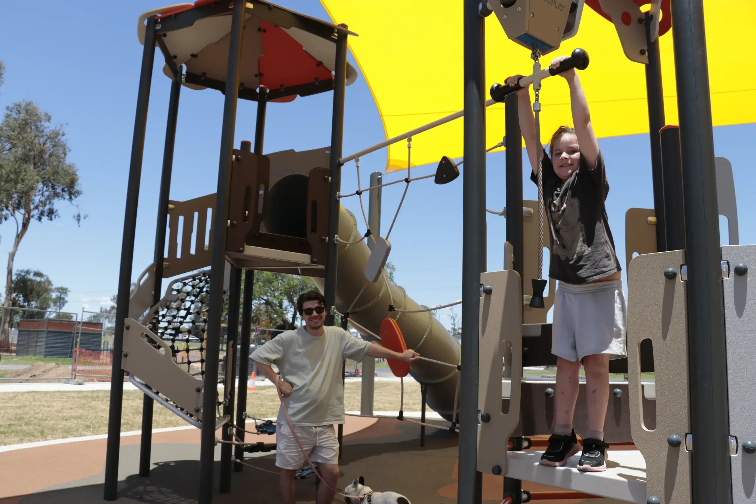 <p>Connor and Savannah Sams exploring the new Lions Park playground. </p>\\n