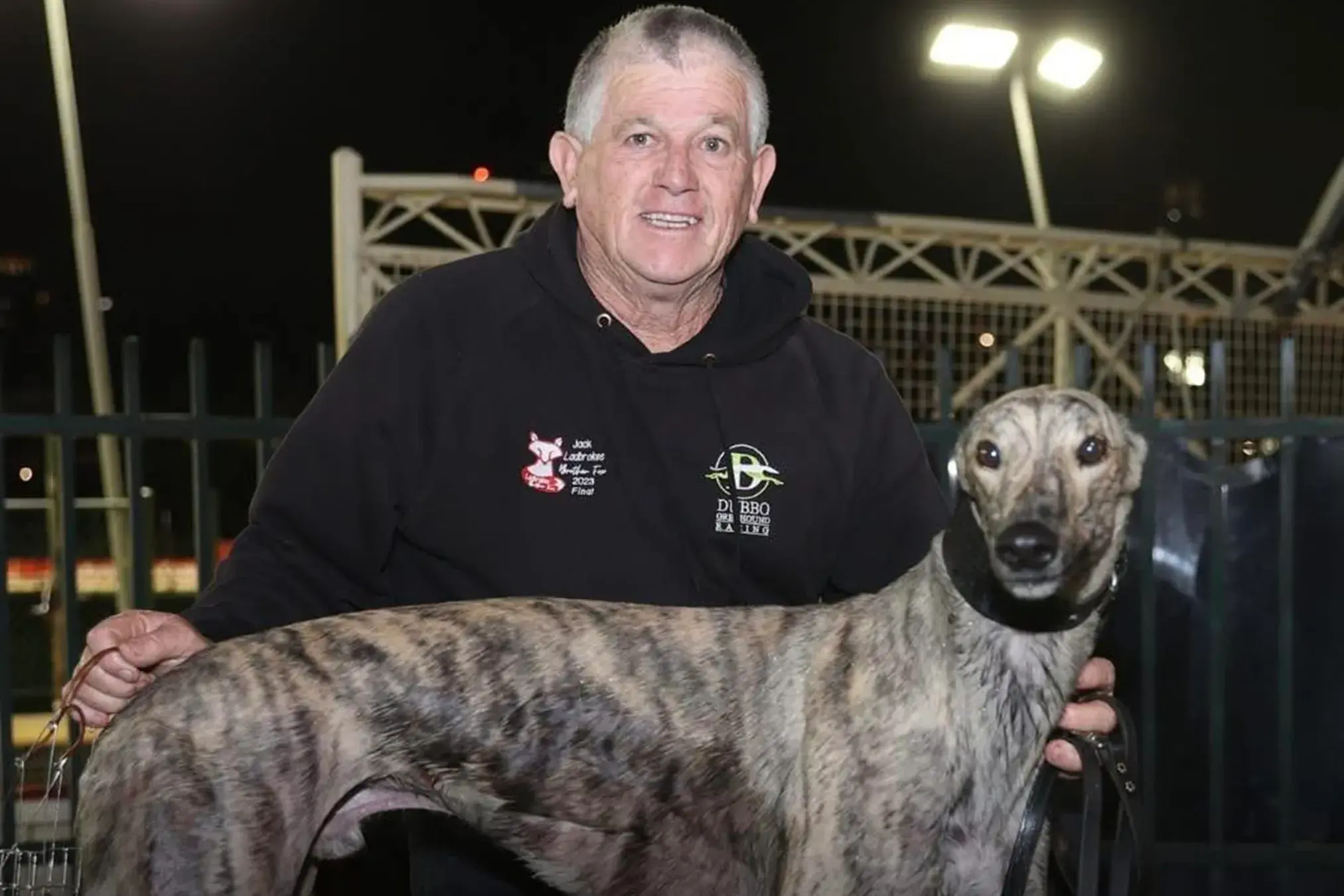 <p>Trainer Raymond Smith with Magpie Hector. PHOTO: Dubbo Greyhounds</p>\\n