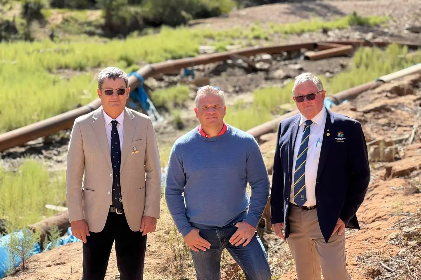 <p>Member for Orange Phil Donato with Parkes shire mayor Neil Westcott and Lachlan shire mayor John Medcalf calling for flood recovery funding. </p>\\n