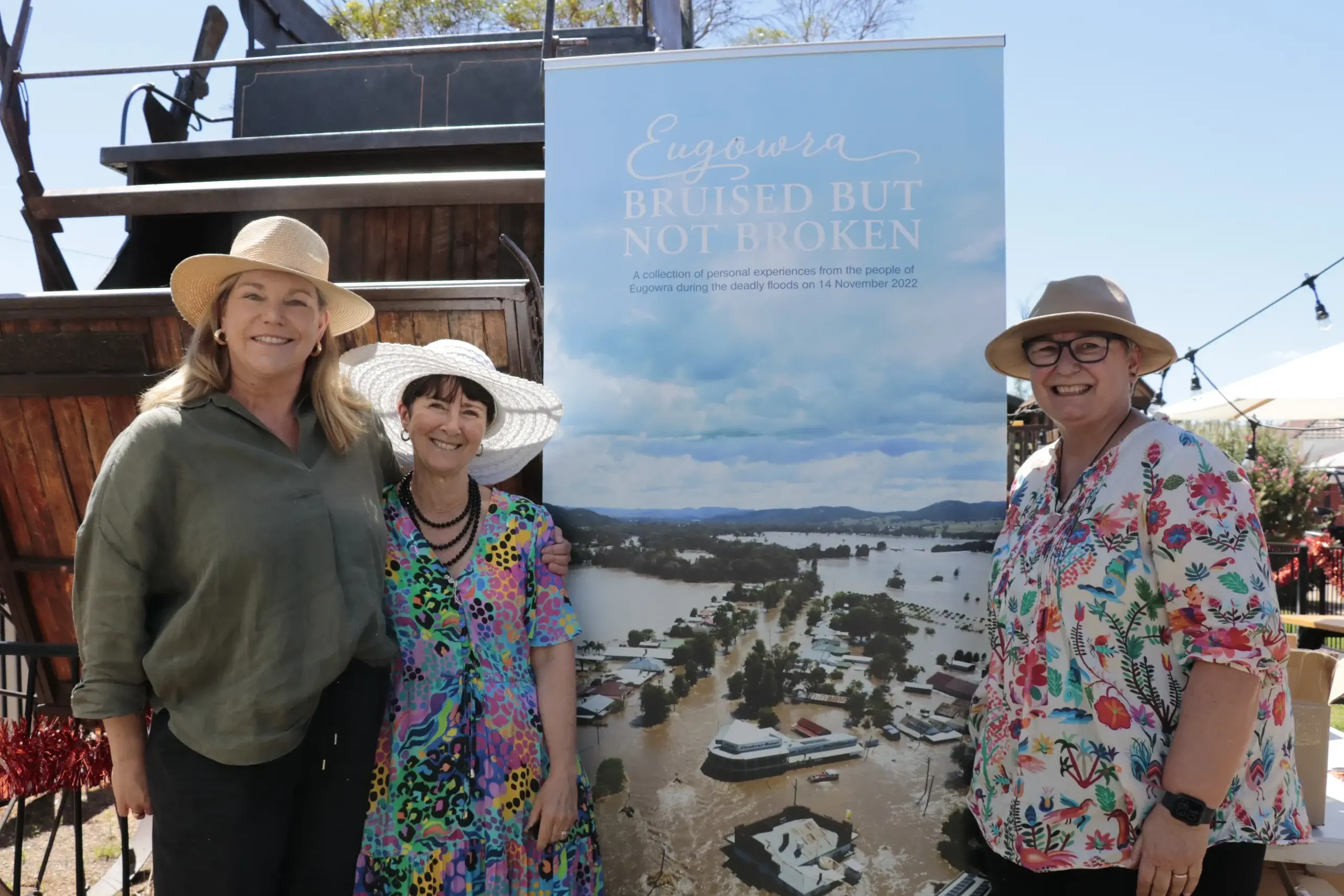 <p>Linda Clark (centre) with Cassie Gates and Therese Welsh who brought together Eugowra: Bruised, Not Broken. </p>\\n