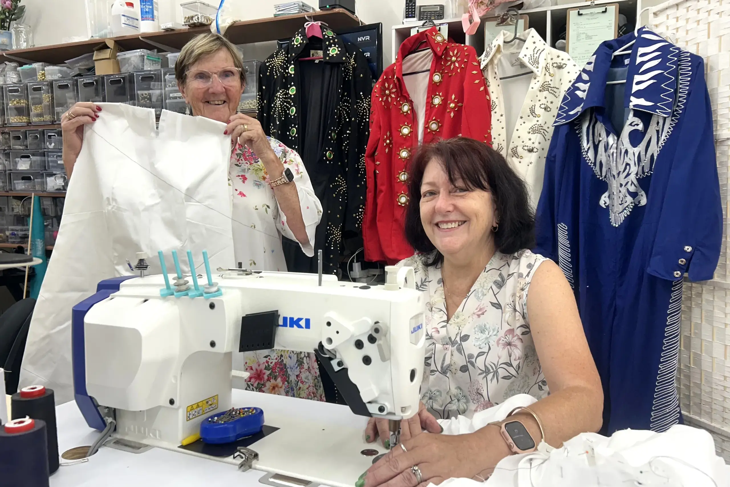 <p>Jo-Ann Lenord with Chris Curteis who is having Jo make her a versatile white dress to wear to the Parkes Elvis Festival. PHOTO: Madeline Blackstock</p>\\n