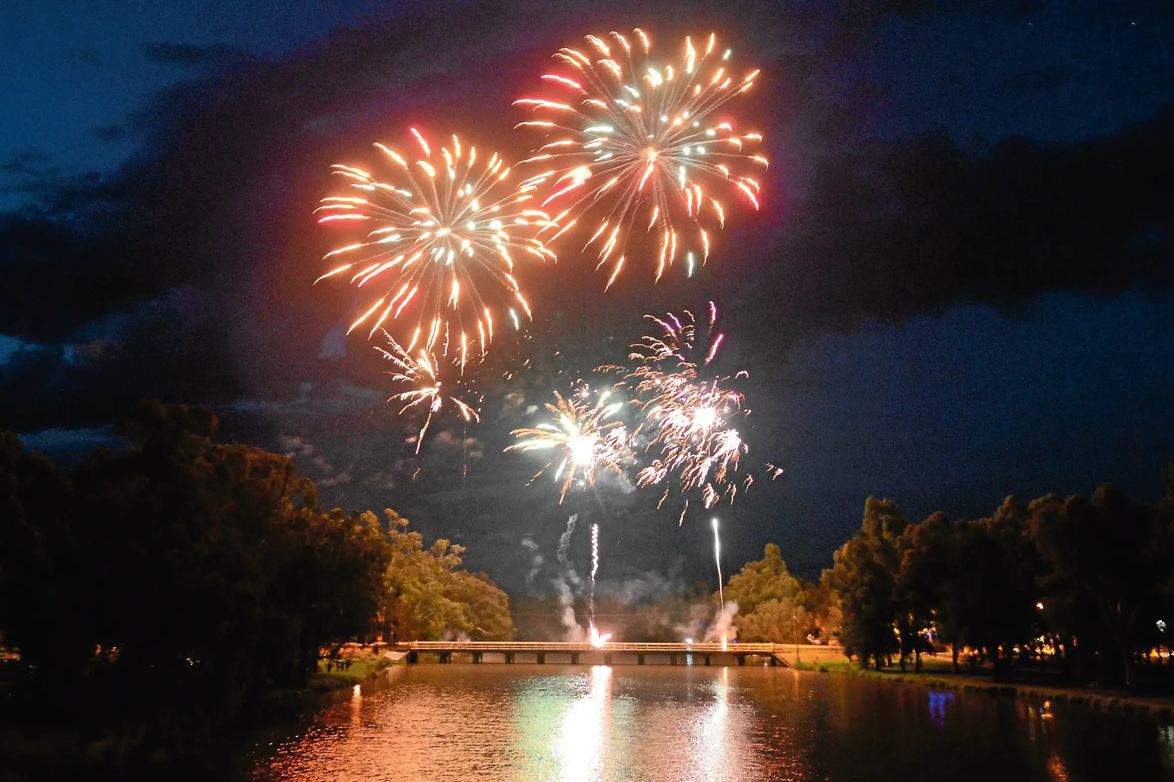 <p>Fireworks light up the sky over Lake Forbes at 9pm Monday, 26 January.</p>\\n