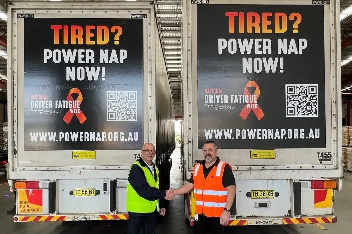 <p>Founder of Truck Ads Rob McKay with Maurice Alexander promoting the vital Power Nap message, which now appears on trucks, digital platforms and workplace safety programs across Australia.</p>\\n