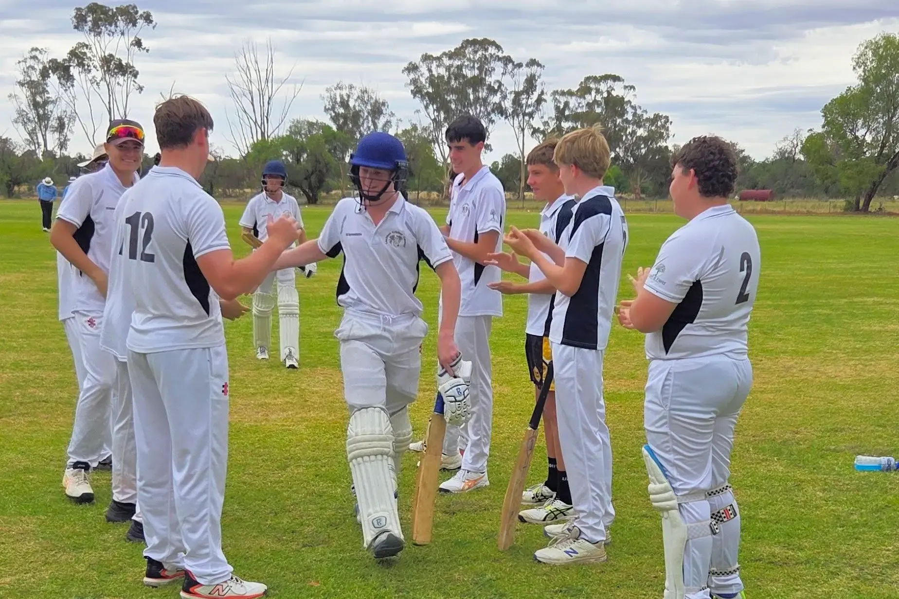 <p>Harry Yelland was congratulated by his teammate for his mammoth effort of 145 runs off 145 balls and not out. PHOTO: Lachlan Cricket Council </p>\\n