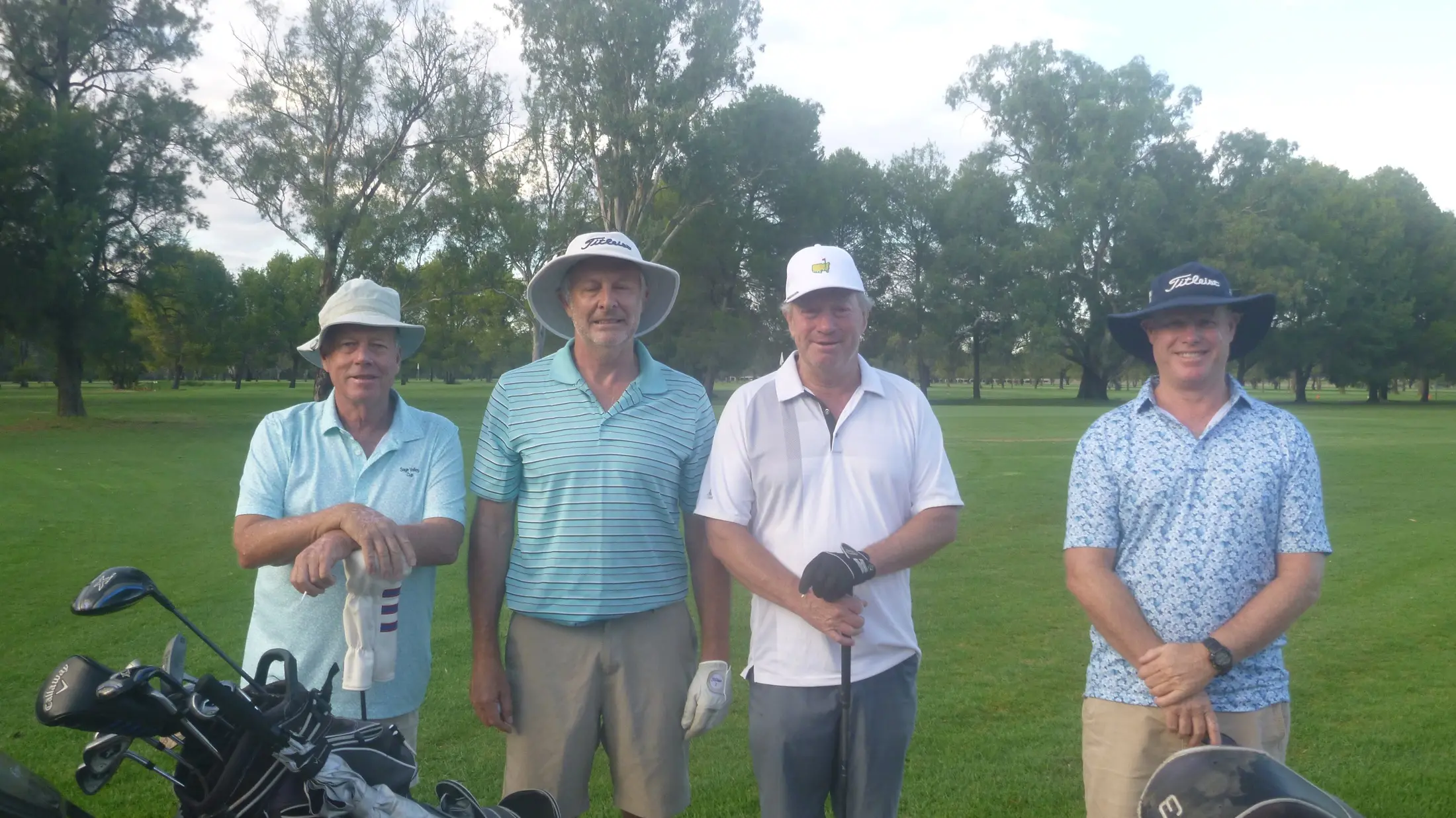 Players evade rain to score well