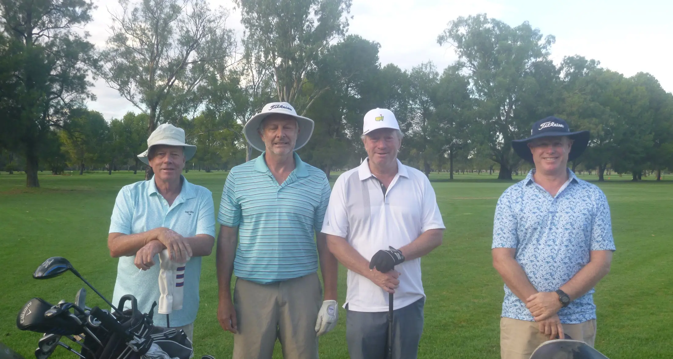 Players evade rain to score well