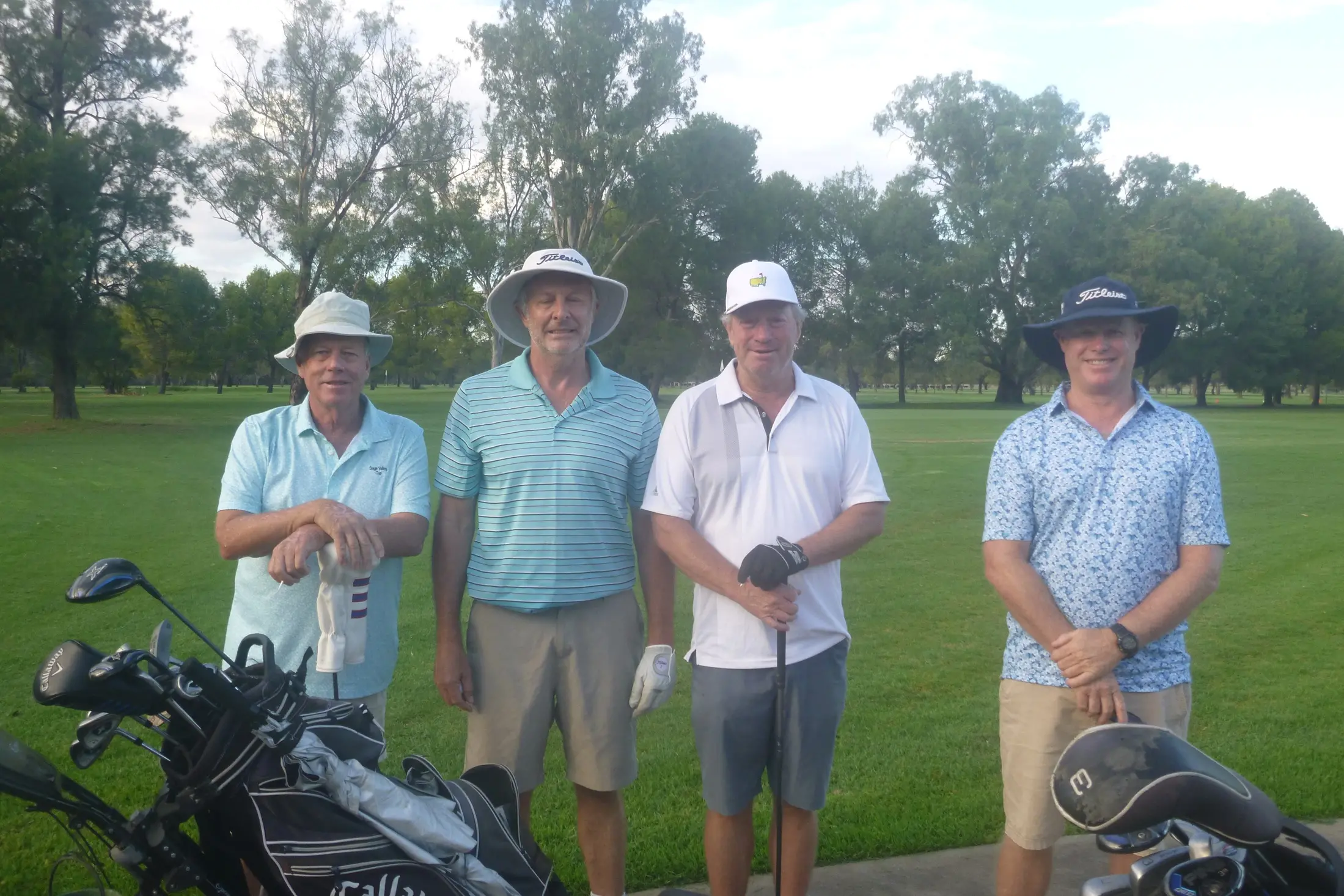 Players evade rain to score well