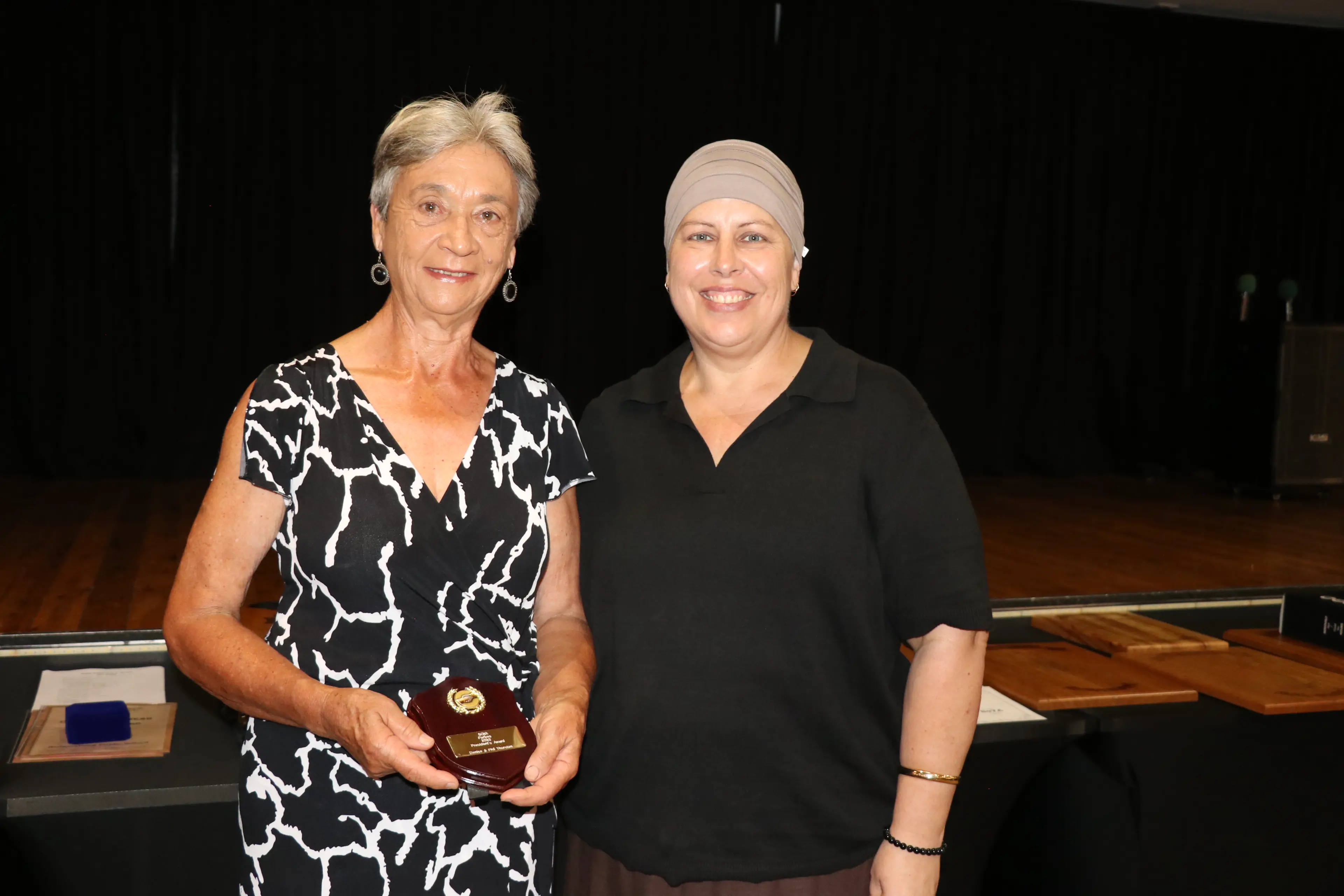 <p>Denise Thurston accepts the President\\'s Award from SOYA president Emma Little. </p>\\n