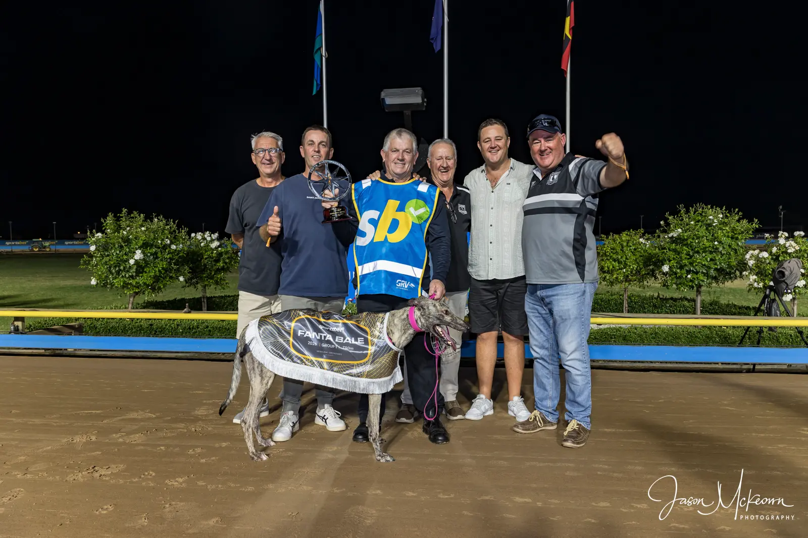 <p>Trainer Raymond Smith with delighted connections Brendan Hayes, Matt Bull, Michael Walker, Steve Walker and Andrew Walker celebrate a previous win at The Meadows. PHOTO: Jason McKeown Photography</p>\\n