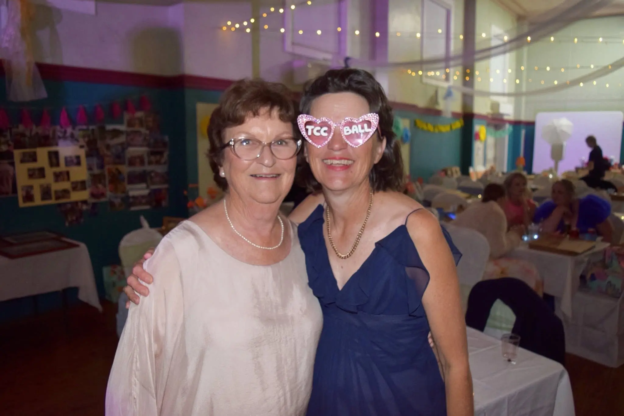 <p>Karen Quade and Cherie Stitt having a grand time celebrating 50 years of the Trundle Children\\u2019s Centre and helping to raise funds for its bright future. PHOTOS: Submitted</p>\\n