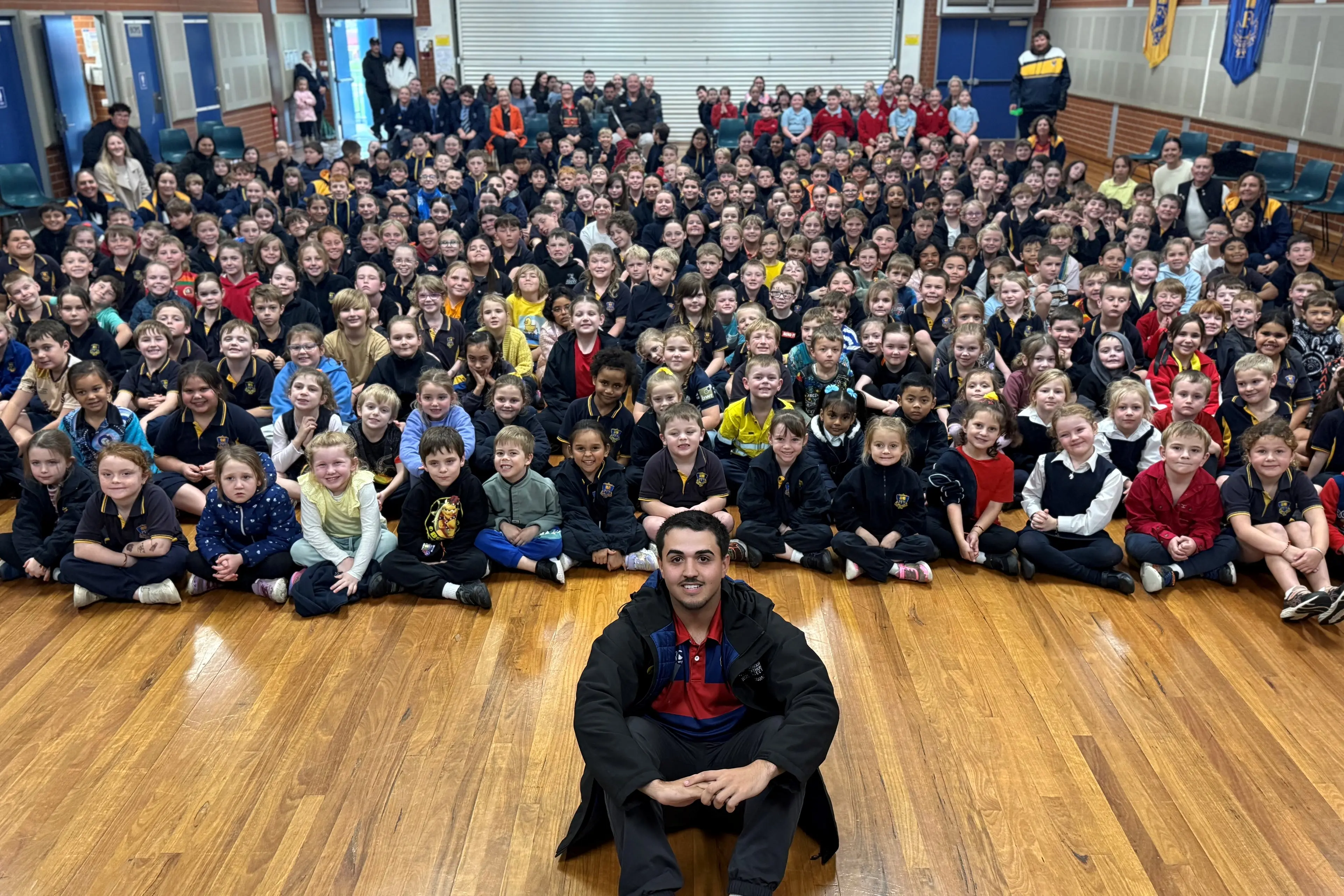 <p>Jack Peckham returned to his primary school to encourage the next generation of students to have a go at the opportunities they\\'re offered.</p>\\n