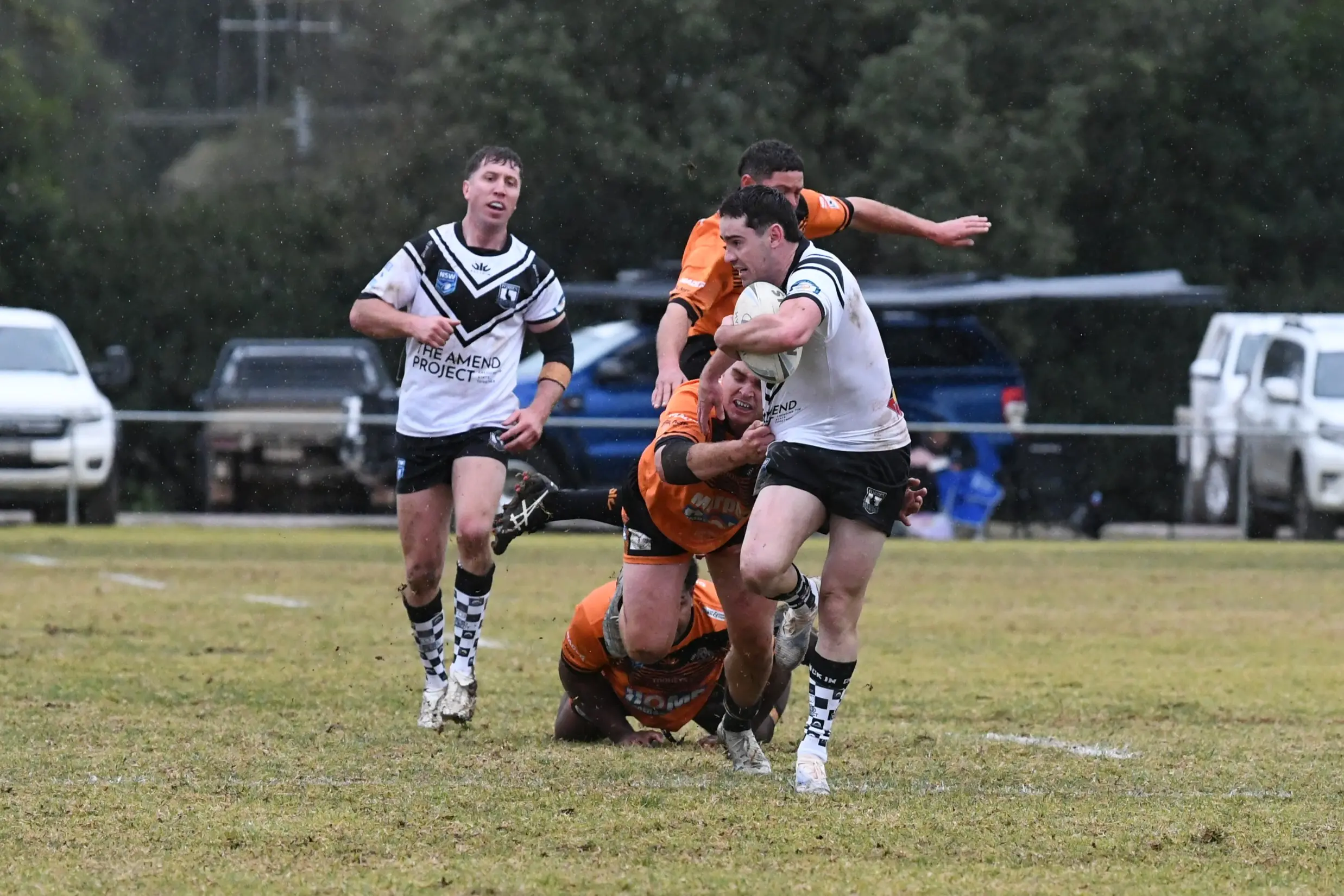 <p>Chad Porter working his way out of Nyngan\\'s grasp. </p>\\n
