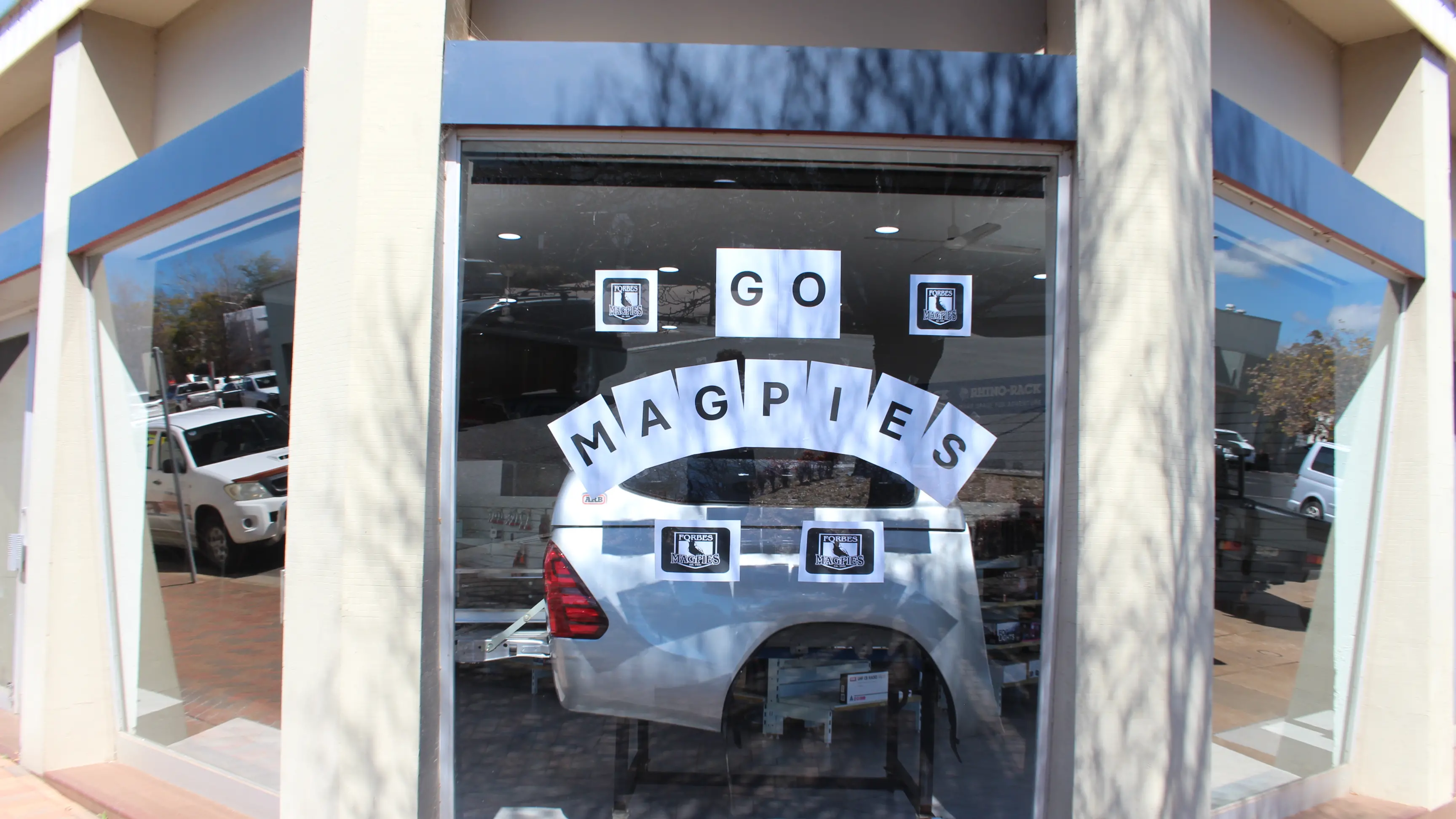 Town turns black and white for Magpies