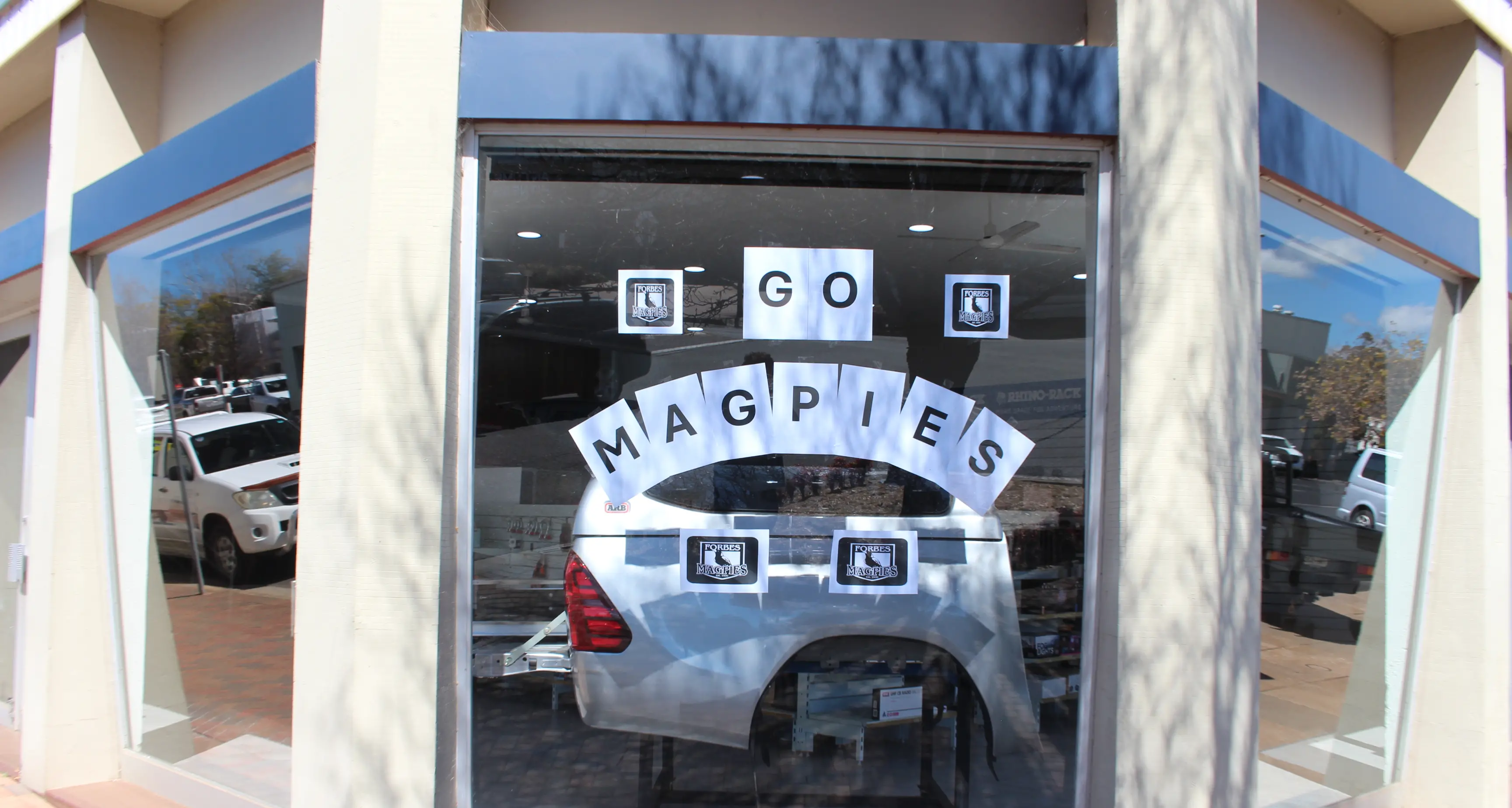 Town turns black and white for Magpies