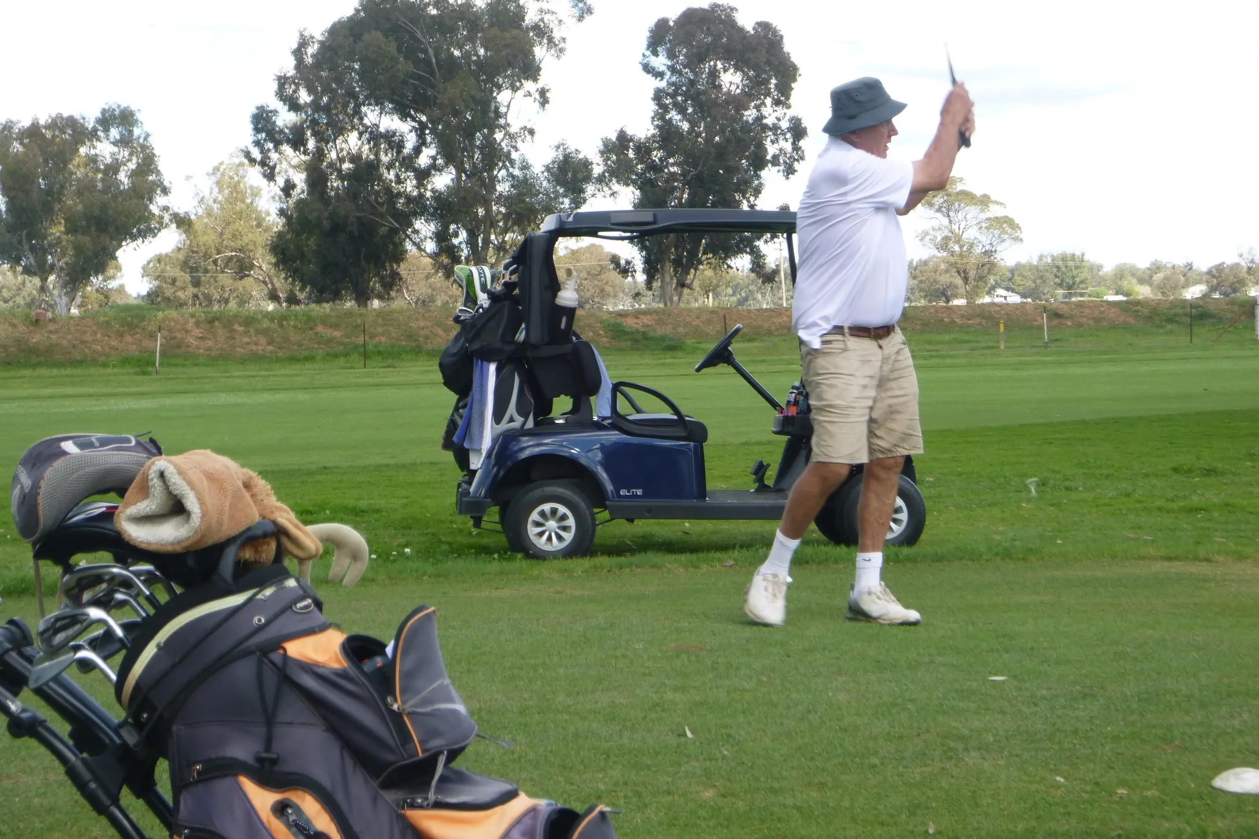 <p>Stephen Uphill finishes his swing and watches the ball.</p>\\n