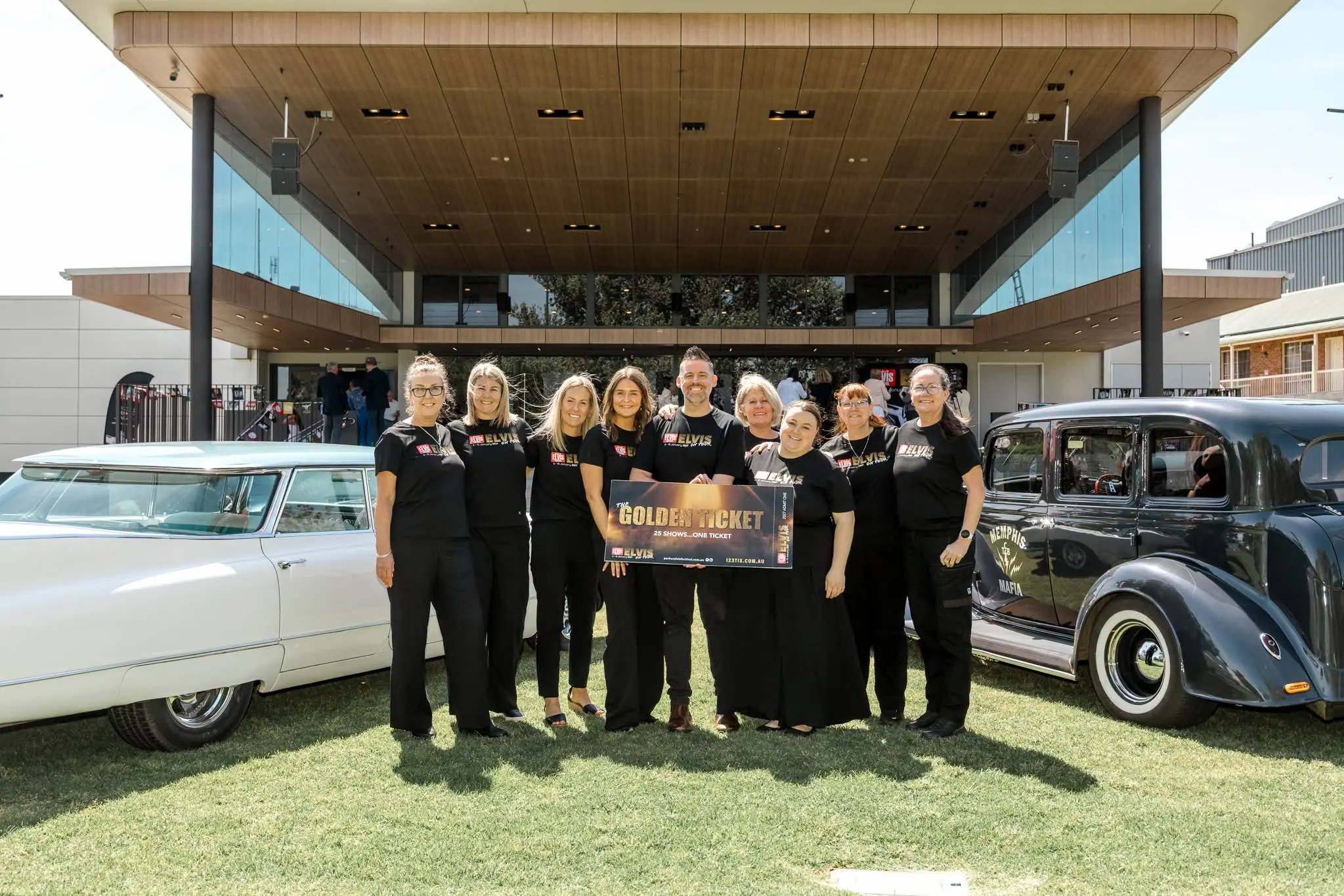 <p>Parkes Elvis Festival director Brendan Shipley with his team and the exclusive Golden Ticket. PHOTO: Brent Young</p>\\n