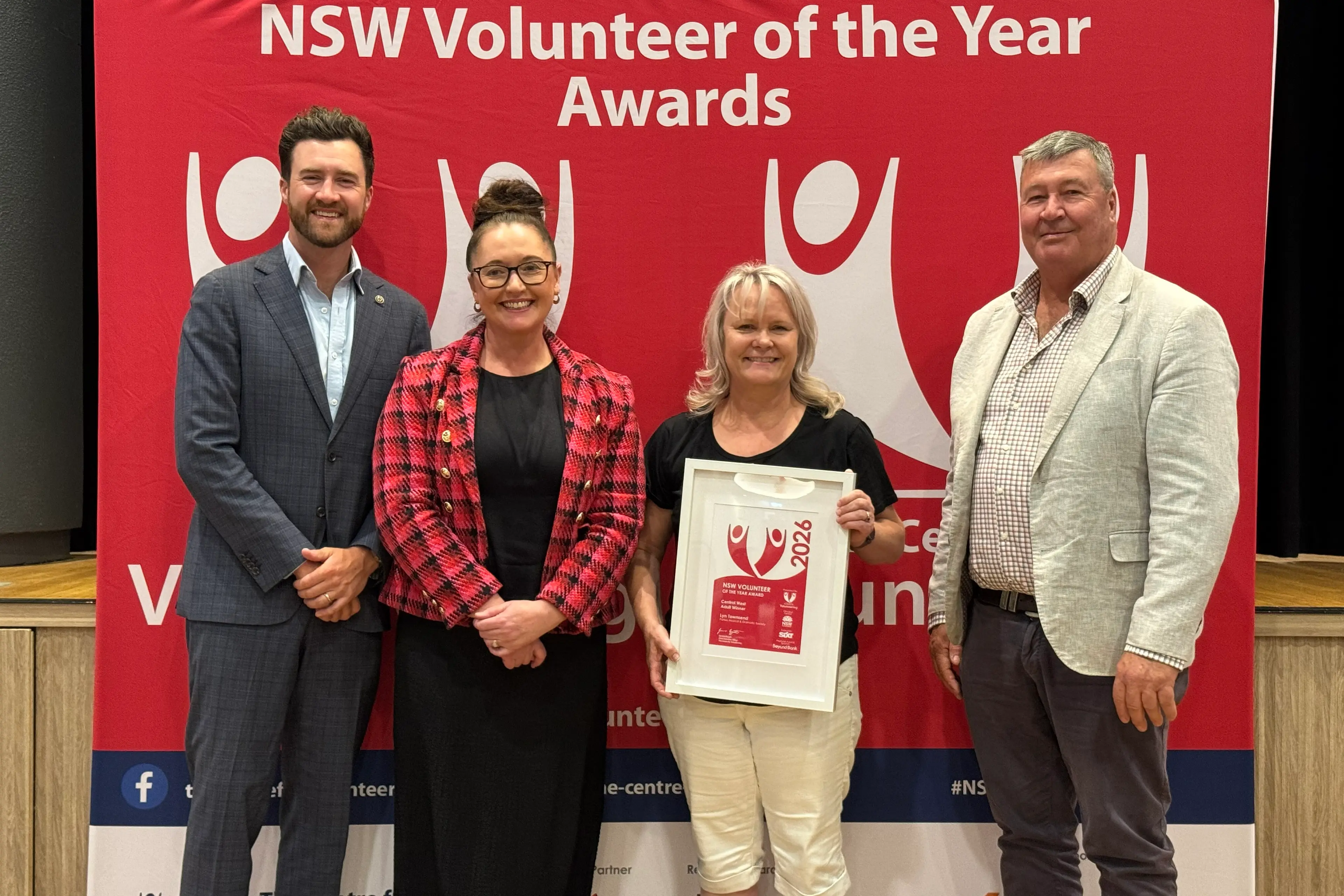 <p>Bathurst mayor Ben Fry, Parkes councillor Marg Applebee and Cabonne mayor Kevin Beatty (right) congratulate Lyn Townsend on winning Central West Adult Volunteer of the Year.</p>\\n