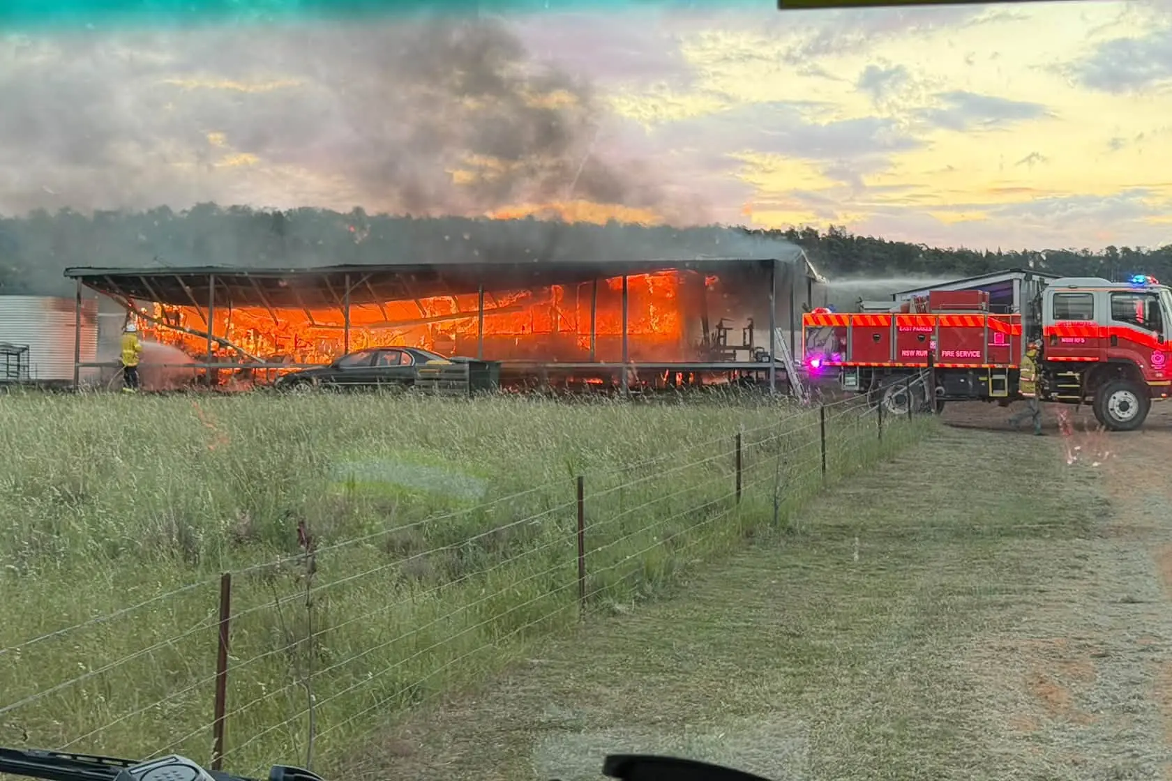 <p>Multiple fire brigades, including Parkes Fire and Rescue NSW, were called to a house fire on a property on Cooka Hills Road on Saturday night. PHOTOS: RFS Parkes Headquarters Brigade</p>\\n